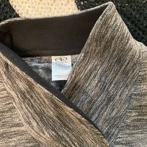 Grey and black cross neck sweater.